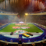 Blick in einen Stadion mit Feuerwerk